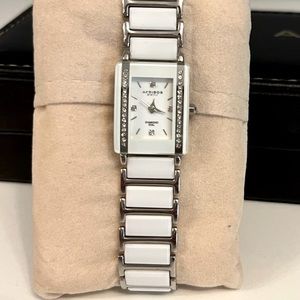 Akribos XXIV women’s quartz diamond base metal with ceramic links, white, new!